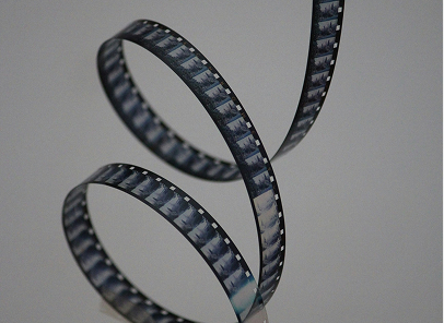 Bobine de film en spirale, évoquant la narration et la stratégie de gamification.